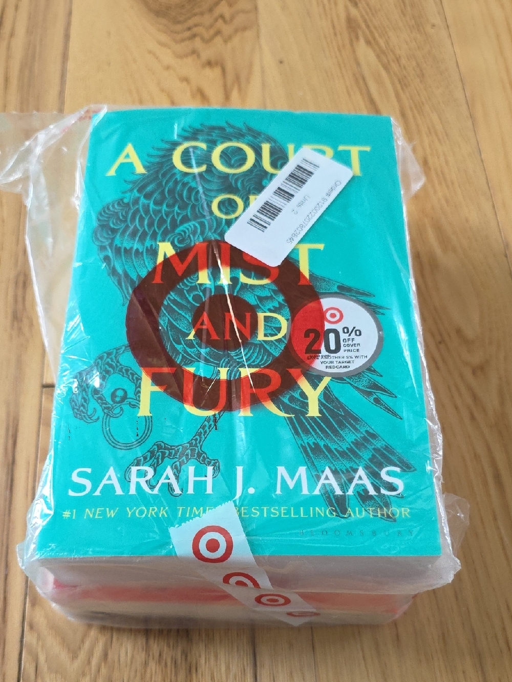 A Court of Mist and Fury and A Court of Thorns and Roses by Sarah J. Maas